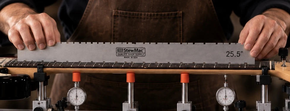Electric guitar neck measured on an Erlewine Neck Jig with three supports and two independent dial indicators